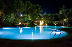 Pool and waterfall at night