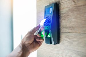 Access control in Coral Springs as a door is opened with a keypad and keycard