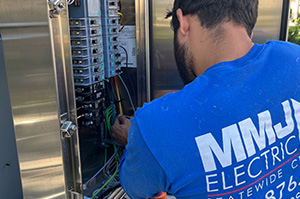 technician working on electrical box in Fort Lauderdale-Boca Raton-Deerfield Beach Residential and Commercial Electrician
